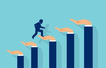 Vector of a businessman climbing a career ladder made of human hands helping him. © Feodora
