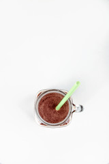 Sports nutrition with chocolate protein shake, top view. Copy space