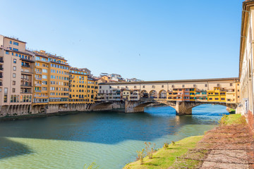 Fototapeta premium Ponte Vecchio bridge sunny day in Florence, Italy
