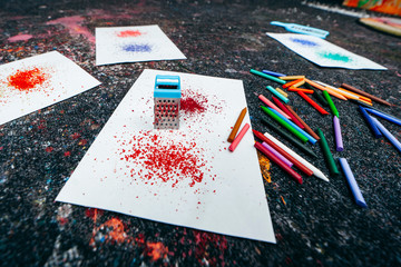 Color pencils on the floor
