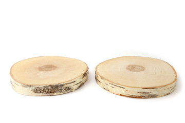 Serving wood trays isolated on white background. Cut birch tree round stump.