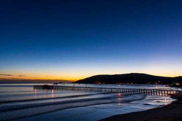 Naklejka premium Darkness falls over the Beach at Dusk 