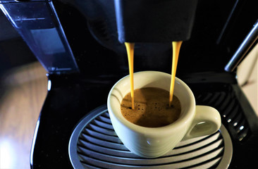 Espresso coffee from coffee machine