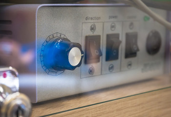 Device to control the voltage of the electrical relay. Blurred background