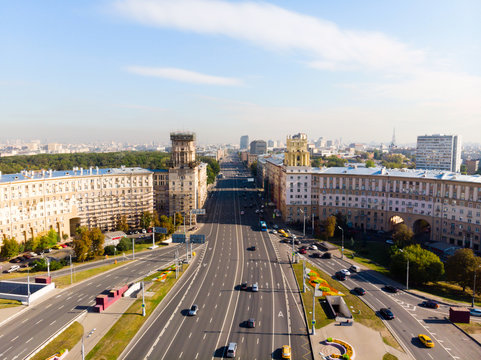 Leninsky Avenue With Monument To Yuri Gagarin During The Midday Down Town. Top View Of The Avenue And Car Traffic.