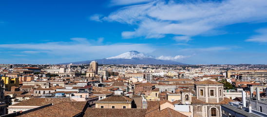 Fototapeta premium Rooftops of Catania in Sicily. In background majestic volcano Etna