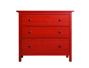 Modern red chest of drawers isolated on white. Furniture for wardrobe room