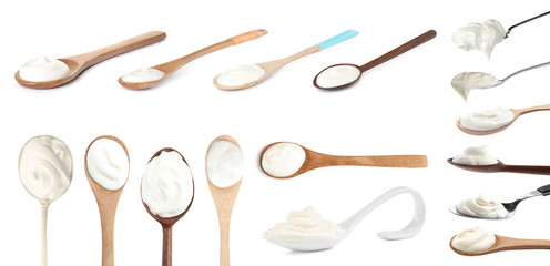 Set of delicious sour cream in spoons on white background
