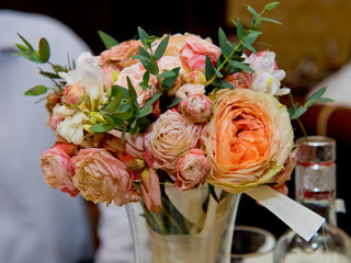 Wedding bouquet from different roses.