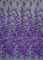 The texture of lace on wooden background