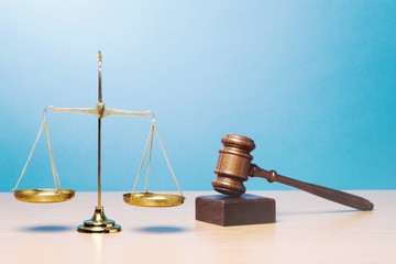 Law scales on table background