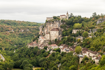 Fototapeta na wymiar Rocamadour, France. Village on a cliff on the gorge of Dordogne river, with the Sanctuary of the Blessed Virgin Mary (Cite religieuse sanctuaire)