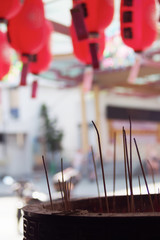 Incense Burner for Incense Holder Wishing for Blessing in Chinese Shrines on Blurred Background Paper Lantern Red Chinese New Year