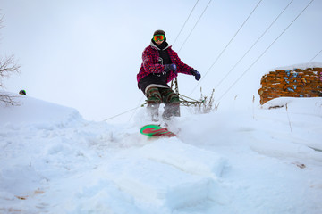 Fototapeta na wymiar snowboarder on a slope