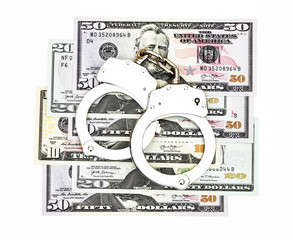 Handcuffs with bank notes