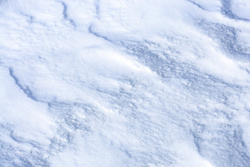 thin crust of ice over snow