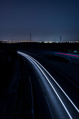 View of abstract shines on road at night