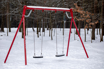 Empty chain swing in playground