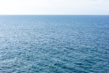 Blue and bright water surface of the Atlantic ocean.