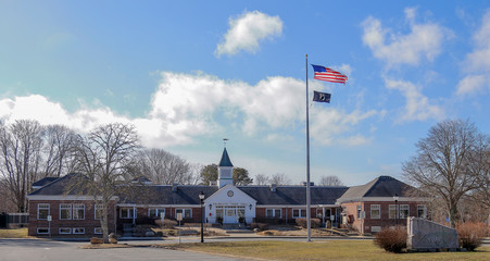 Falmouth Town Hall on Town Hall square in Falmouth, Massachusetts in sunny winter day
