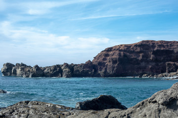 Fototapeta na wymiar Waves splashing against the rocks. Lanzarote island.