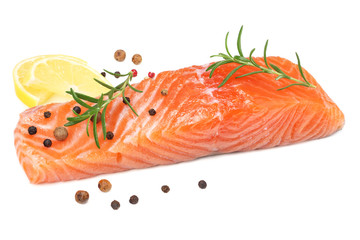 Red fish. Raw salmon fillet with rosemary and lemon isolate on white background.