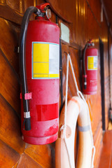 Fire Extinguisher, fire protection device used in emergency situation with hand held cylindrical...