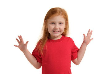 Little girl smiling with his arms up. 5 years old girl surprised with smile and hands near her hands