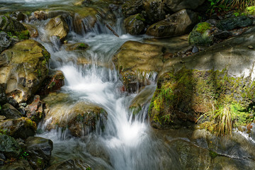 Fototapeta na wymiar Cascade or waterfall, St James Walkway, Lewis Pass, New Zealand.