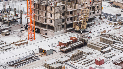 Crane and building construction. Winter air view © paulzhuk