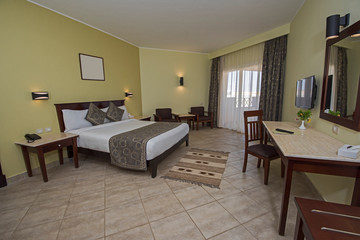 Double bed in a luxury suite of a hotel room