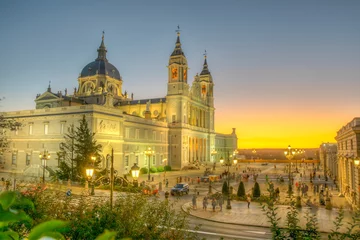 Rolgordijnen Sunset view of the Almudena cathedral in Madrid © dudlajzov