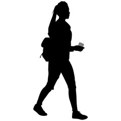 woman with backpack in sneakers with phone