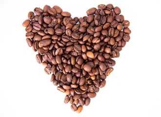 Heart of coffee beans on white background.
