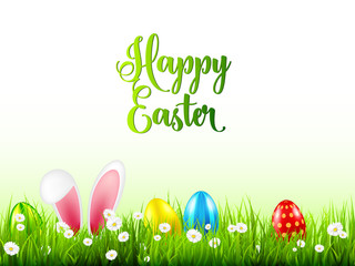 Easter eggs on grass with bunny rabbit ears set. Spring holidays in April. Sunday seasonal celebration with egg hunt.