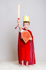 child in knight costume with crown - 246247172