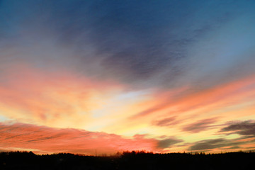 Beautiful shot of the sky during sunset with unusual color and clouds.