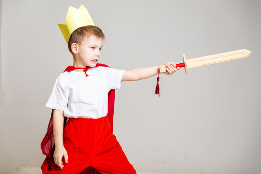 Child In Knight Costume With Crown