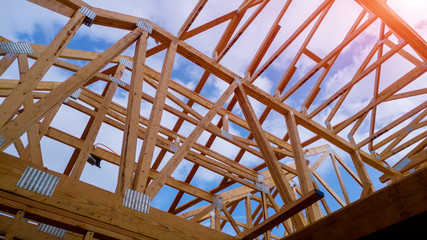 Residential home framing view on new house wooden under construction