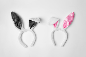 Top view of two rabbit ears on white background pink and couple love holiday easter concept copy space