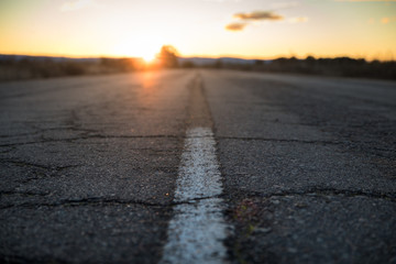 road and asphalt in a sunset