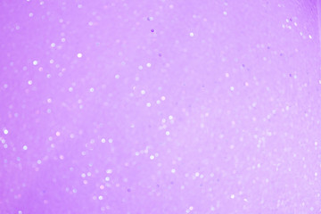 Obraz premium Bokeh tło, fioletowe tło. Niewyraźne tło. Wróżkowy połysk. Różowy streszczenie tło.