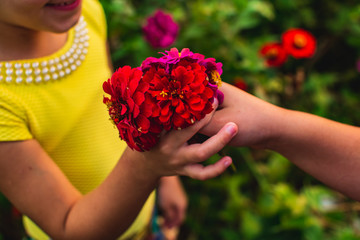 woman holding a bunch of flowers