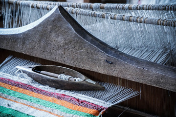 old loom with a rug