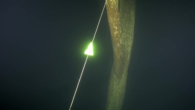 Cave line arrow glows in the H2S cloud