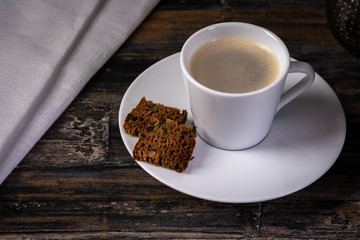 Cup of coffee and two small brownies