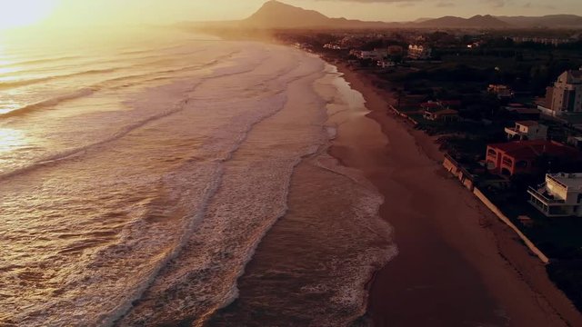 Areal view from the drone of Spain sea and the beach in the morning