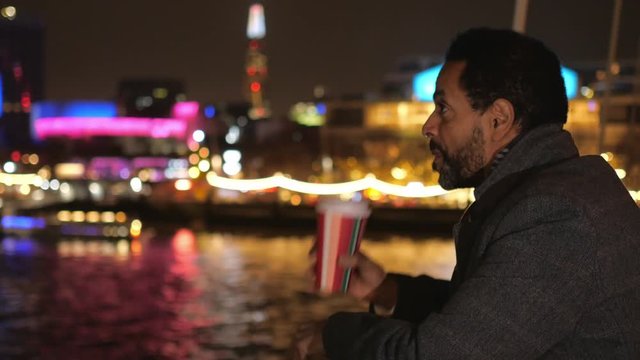 African guy in London on a sightseeing trip