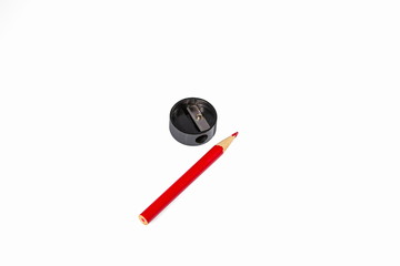 Closeup view of pencil and sharpener isolated. Office, Stationery, Supplies, School background.
