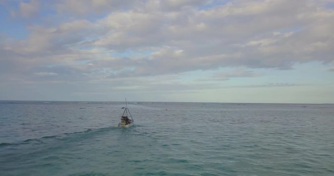 FIB - Flying Inflatable Boat. Aerial shot following the Amphibious Aircraft Sailing in the Sea